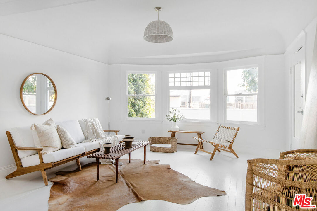 1163 Nelrose Avenue Venice, CA 90291 - Photo 2 of 32 a living room with furniture and a large window