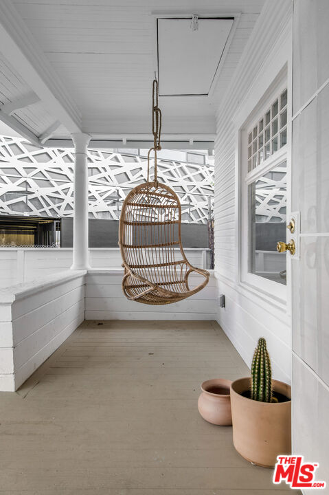 1163 Nelrose Avenue Venice, CA 90291 - Photo 32 of 32 a view of empty room with wooden floor and windows