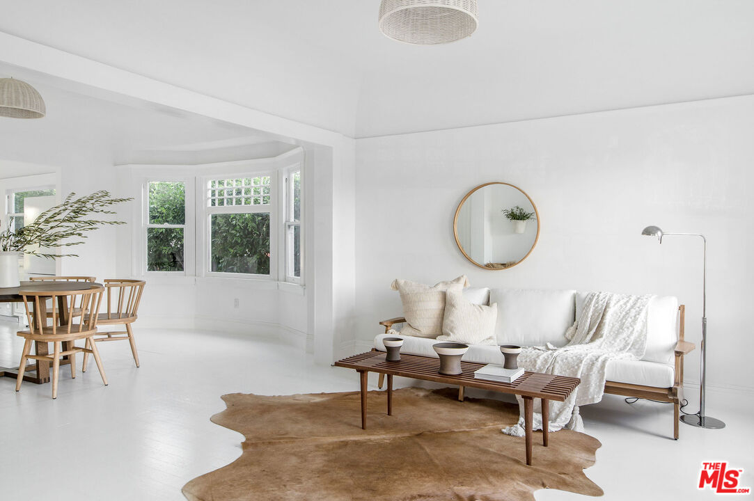 1163 Nelrose Avenue Venice, CA 90291 - Photo 5 of 32 a living room with furniture and a large window