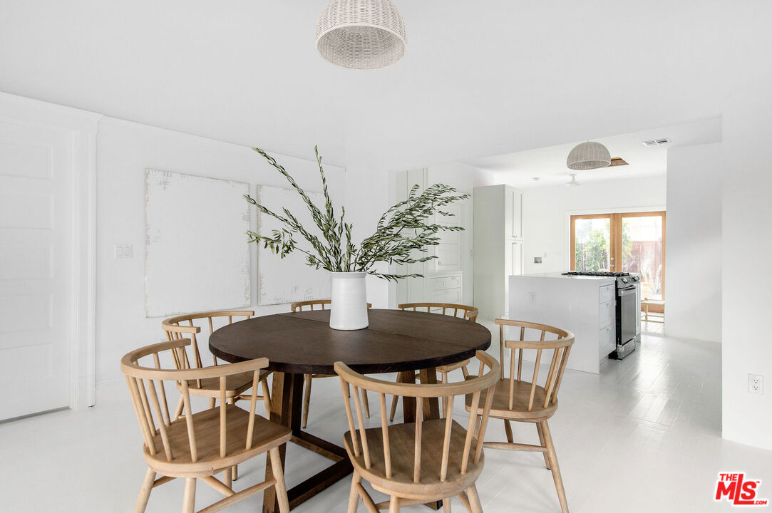 1163 Nelrose Avenue Venice, CA 90291 - Photo 10 of 32 a view of a dining room with furniture and wooden floor
