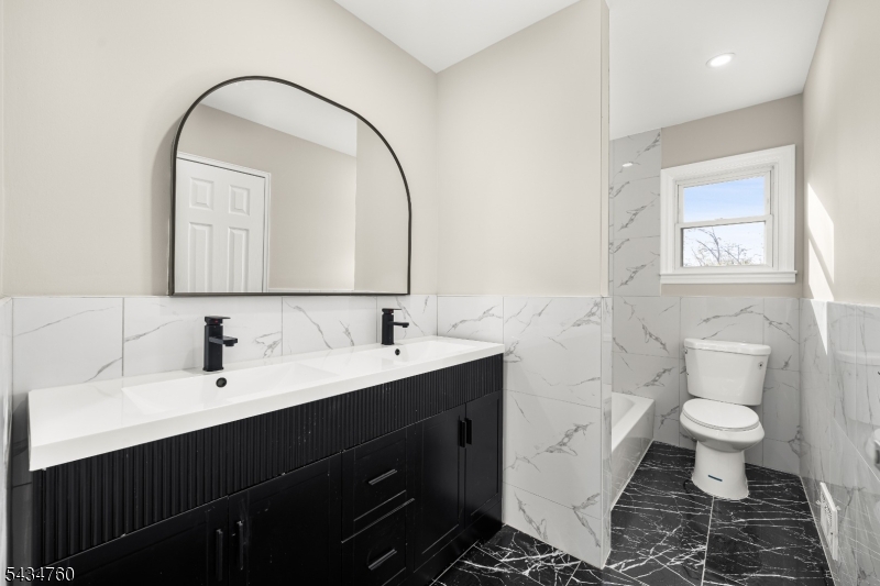 641 Ydv-ham Sq Road Robbinsville, NJ 08691 - Photo 32 of 49 a bathroom with a toilet sink and mirror