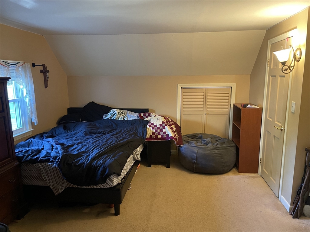 75 Lexington Road Billerica, MA 01821 - Photo 11 of 25 a bedroom with a bed and window