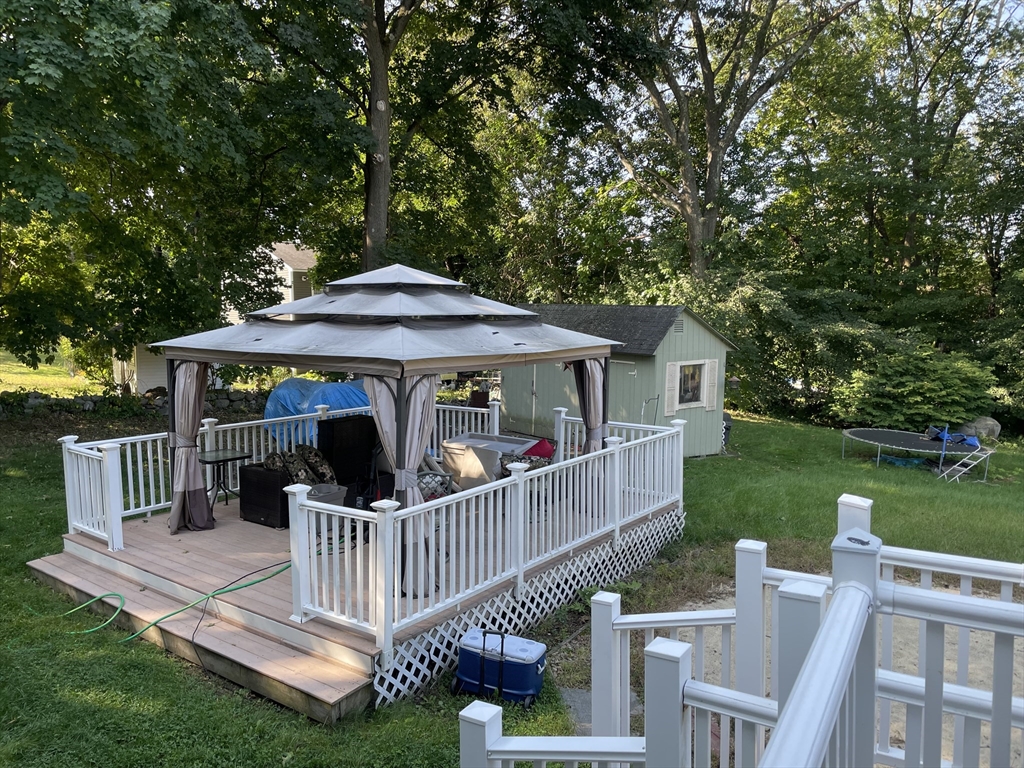 75 Lexington Road Billerica, MA 01821 - Photo 25 of 25 a view of a deck with furniture and garden