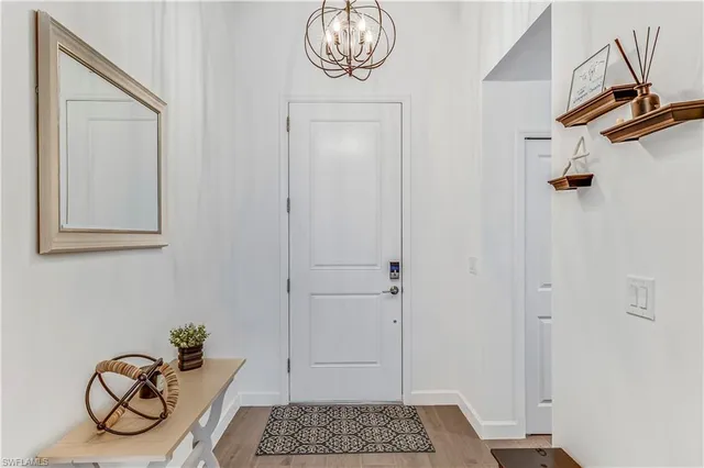 a view of entryway with wooden floor