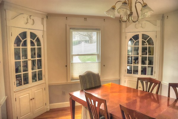 37 Webster Road Lexington, MA 02421 - Photo 8 of 11 a view of a dining room with furniture window and wooden floor