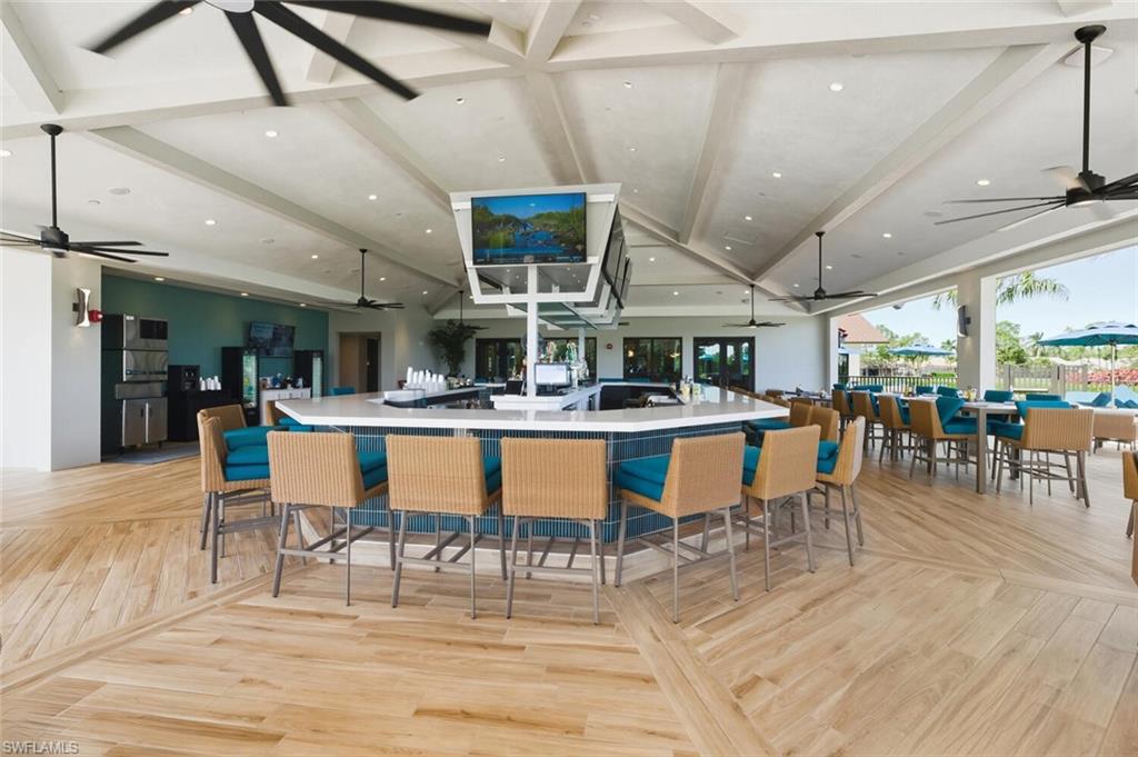 209 Countryside Drive Naples, FL 34104 - Photo 50 of 50 Kitchen with open floor plan, recessed lighting, beamed ceiling, a ceiling fan, and light countertops