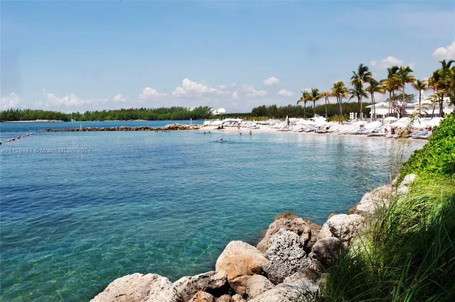 a view of house with yard and sitting area