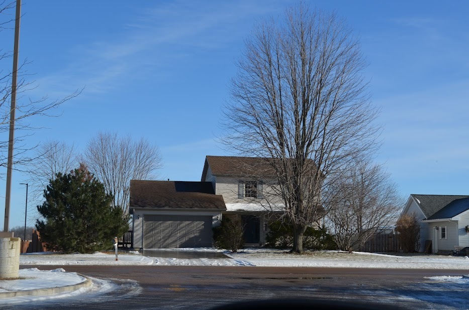 Undisclosed Address Somonauk, IL 60552 - Photo 2 of 25 a view of a city street from a house
