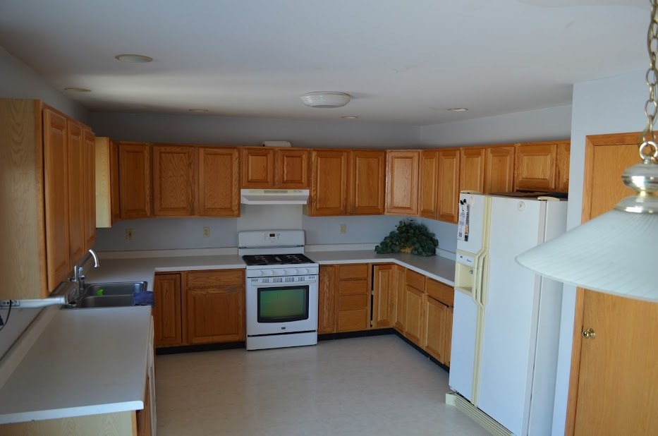 Undisclosed Address Somonauk, IL 60552 - Photo 5 of 25 a kitchen with stainless steel appliances granite countertop a refrigerator stove sink and cabinets