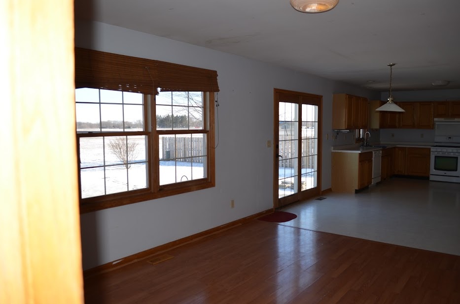 Undisclosed Address Somonauk, IL 60552 - Photo 7 of 25 a view of an empty room with a window