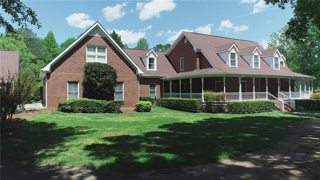 5118 Moon Road Powder Springs, GA 30127 - Photo 1 of 1 Long circular driveway nestles this beautiful