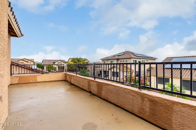 a view of a balcony with city view