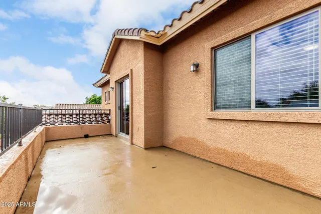 a view of balcony with a roof deck