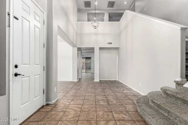 a view of a bedroom with a hallway