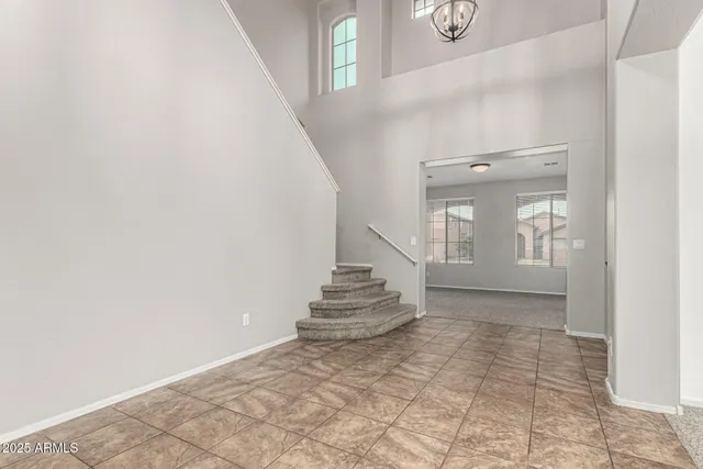 a view of entryway and hall with a window