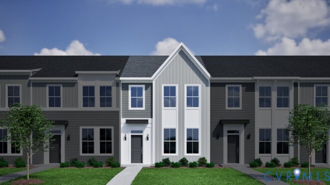 a view of house with yard and front view