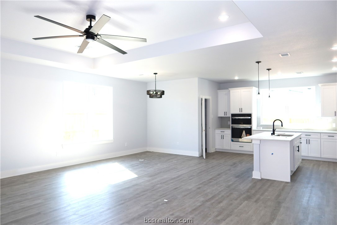 2008 Reagan Court Bryan, TX 77802 - Photo 5 of 21 a view of a kitchen with a sink and a refrigerator