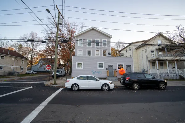 a view of a cars parked in front of a building
