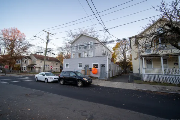 a car parked in front of a building