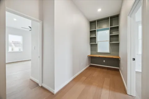 a view of a kitchen with furniture and a window
