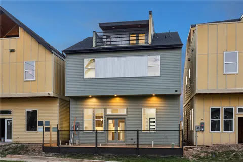 a view of a house with a street