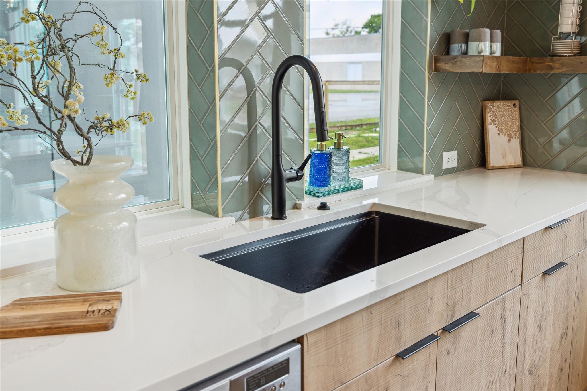 3902 Zina Way Houston, TX 77018 - Photo 4 of 48 a kitchen with a sink and a potted plant