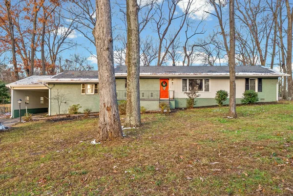 front view of a house with a yard