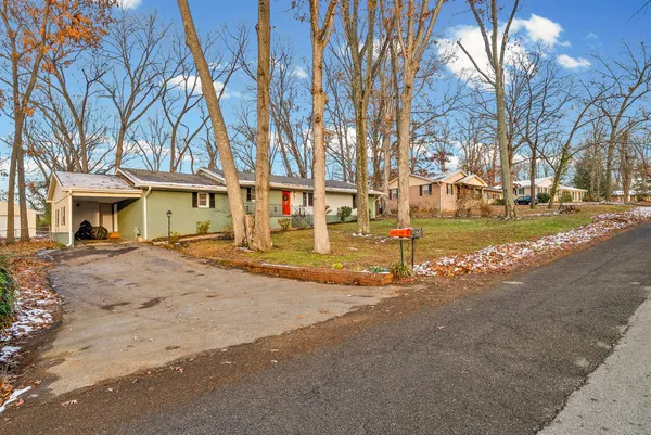 a front view of a building with street view