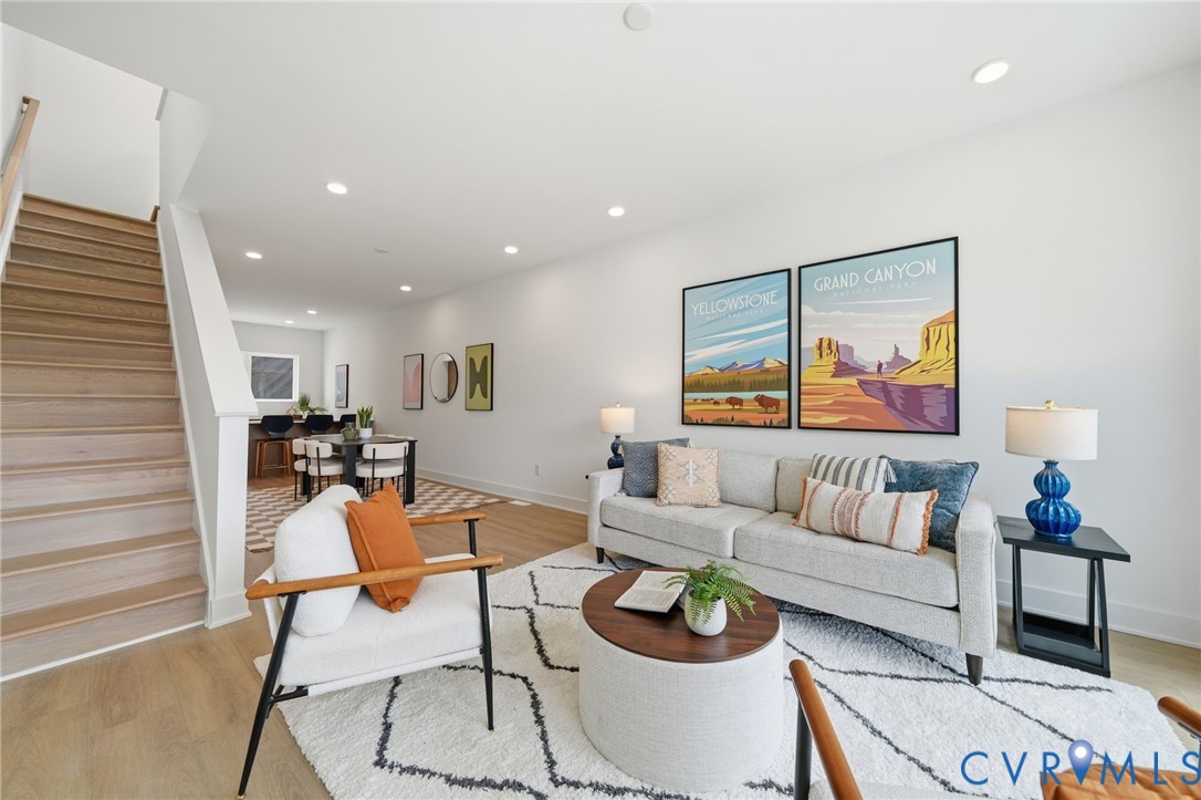 606 Decatur Street Richmond, VA 23224 - Photo 17 of 24 a living room with furniture and a lamp