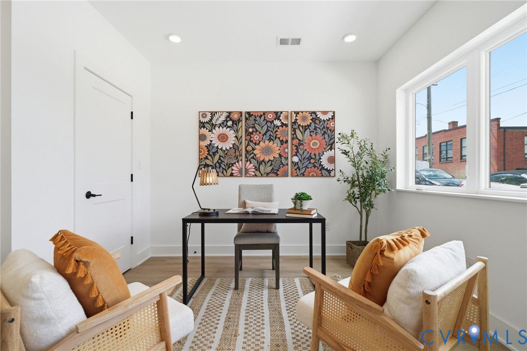 606 Decatur Street Richmond, VA 23224 - Photo 3 of 24 a living room with furniture and a large window