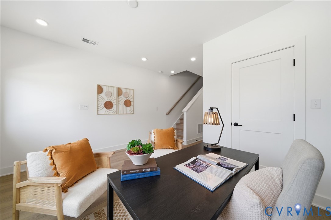 606 Decatur Street Richmond, VA 23224 - Photo 4 of 24 a living room with furniture and next to a window