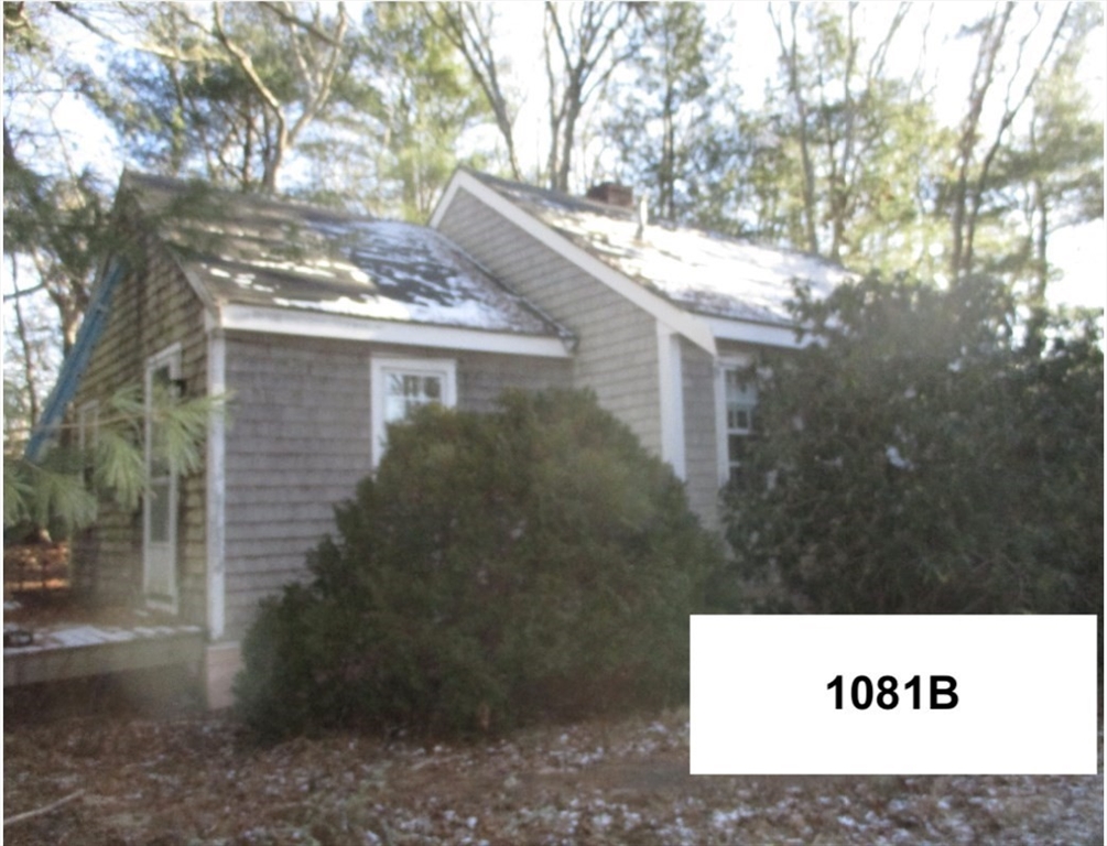 1081 B Main Street Barnstable, MA 02635 - Photo 2 of 5 a view of a tree in front of a house