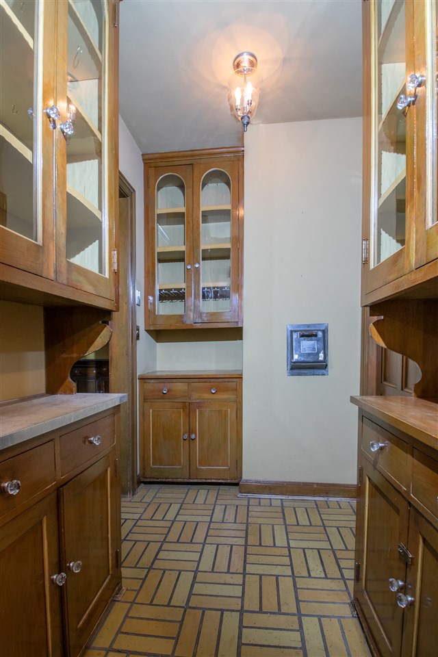 311 Spring Creek Road Rockford, IL 61107 - Photo 13 of 25 a kitchen with stainless steel appliances granite countertop a stove a sink and dishwasher cabinets with wooden floor