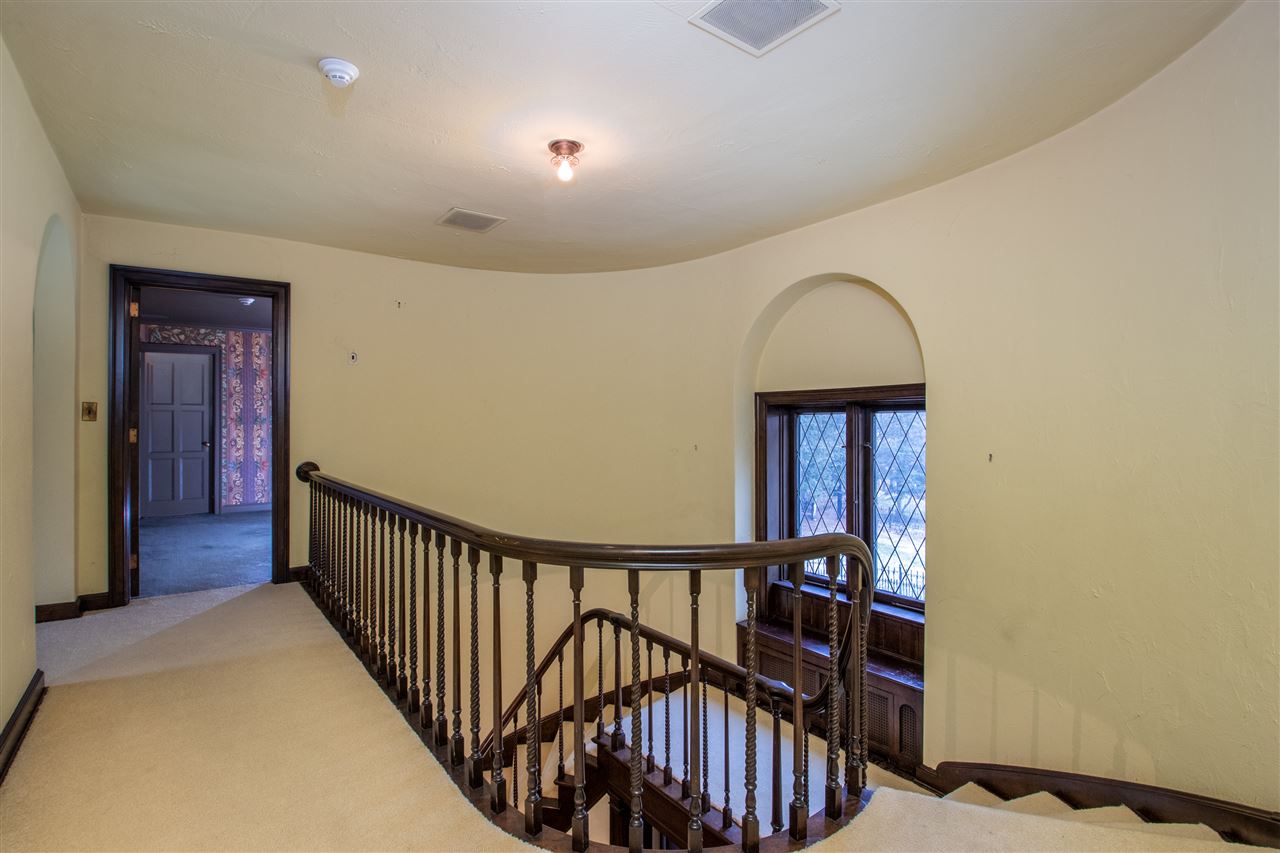 311 Spring Creek Road Rockford, IL 61107 - Photo 15 of 25 a view of a hallway with wooden floor and stairs