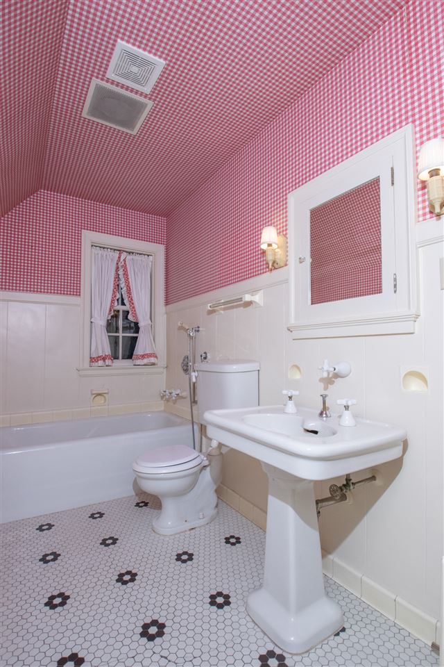 311 Spring Creek Road Rockford, IL 61107 - Photo 19 of 25 a bathroom with a sink mirror and toilet