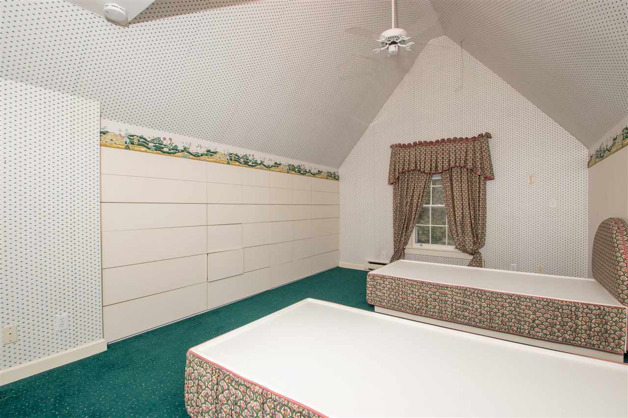 311 Spring Creek Road Rockford, IL 61107 - Photo 22 of 25 a bedroom with a bed and a window