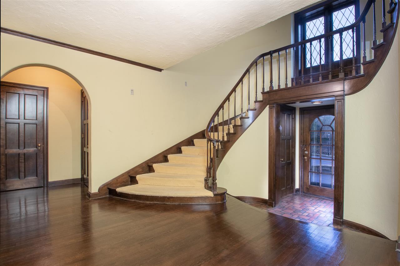 311 Spring Creek Road Rockford, IL 61107 - Photo 3 of 25 a view of entryway with wooden floor and stairs
