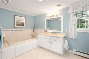117 Perkins Row Topsfield, MA 01983 - Photo 17 of 25 a spacious bathroom with a double vanity sink mirror and bathtub