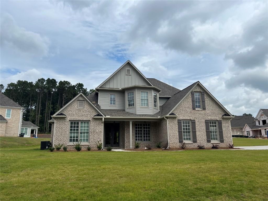 17 Foxcroft Way Villa Rica, GA 30180 - Photo 1 of 1 a front view of a house with a garden