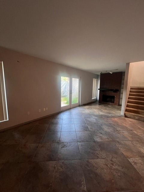 6304 South Rice Avenue Bellaire, TX 77401 - Photo 6 of 16 a view of an empty room with a fireplace