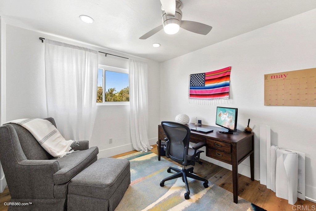 3815 Trieste Drive Carlsbad, CA 92010 - Photo 20 of 24 a workspace with furniture and a window