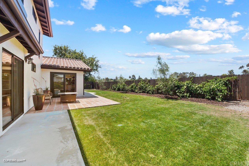 3815 Trieste Drive Carlsbad, CA 92010 - Photo 22 of 24 a view of a house with swimming pool and sitting area