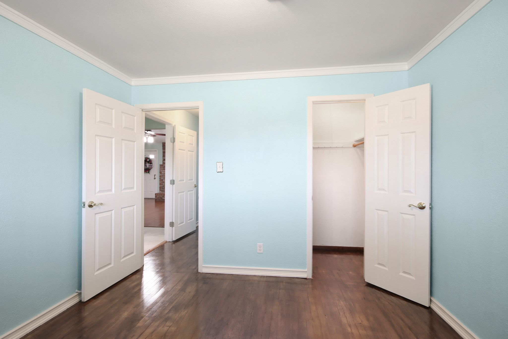 14923 Lofton Street Channelview, TX 77530 - Photo 22 of 25 wooden floor with white walls