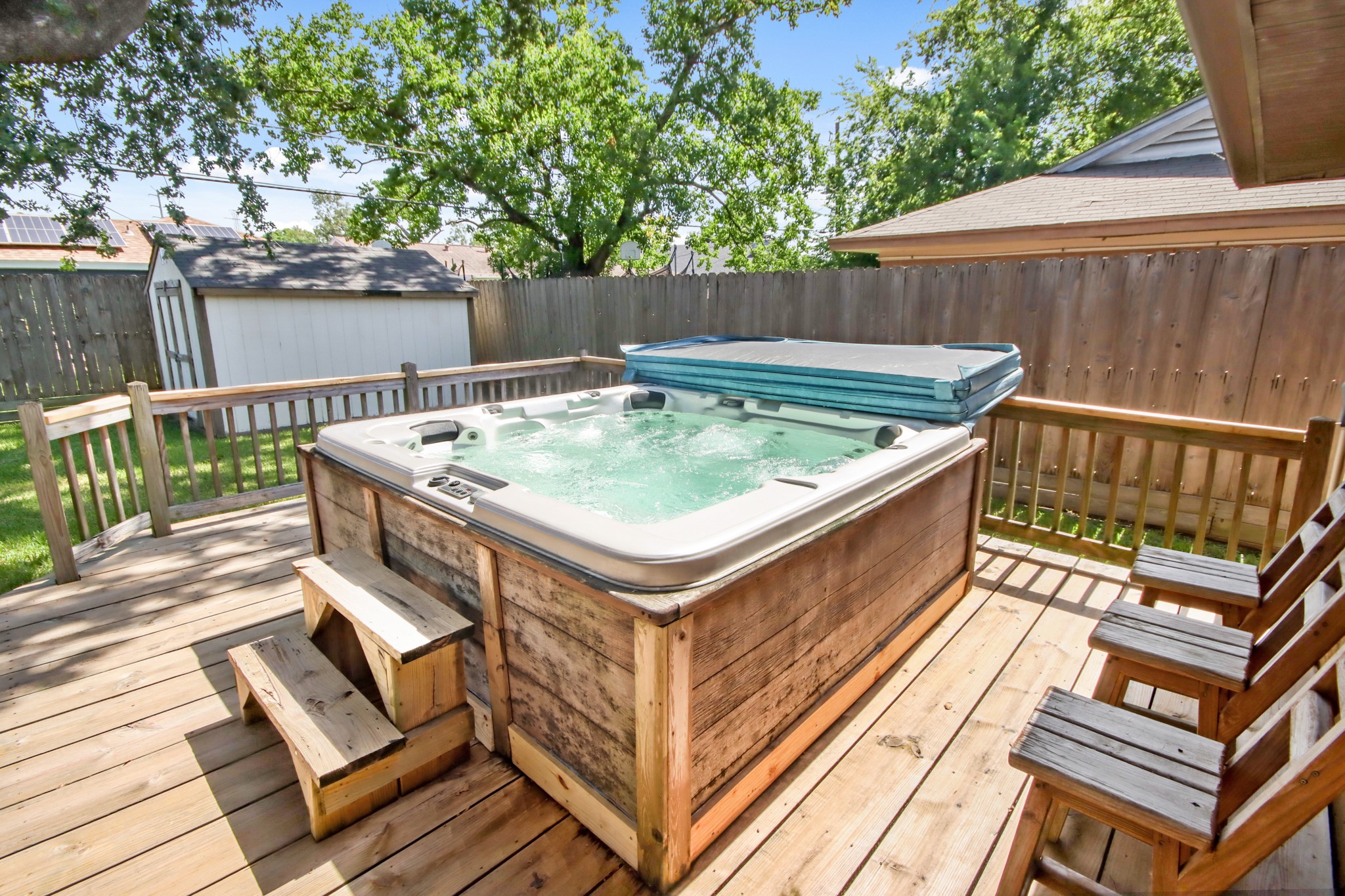 14923 Lofton Street Channelview, TX 77530 - Photo 23 of 25 a view of a two chairs in the roof deck
