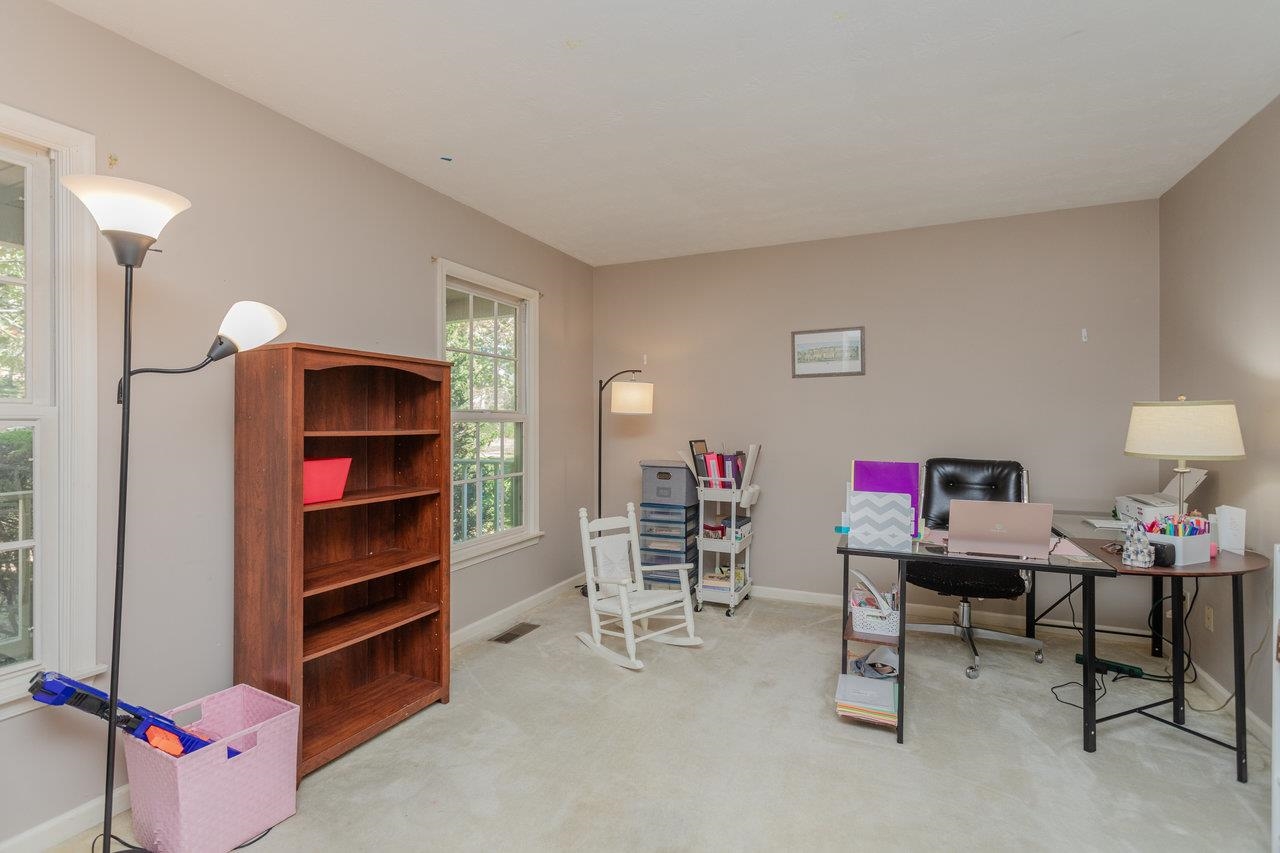1480 Bluewater Road Harrisonburg, VA 22801 - Photo 15 of 46 a living room with furniture and a wooden floor