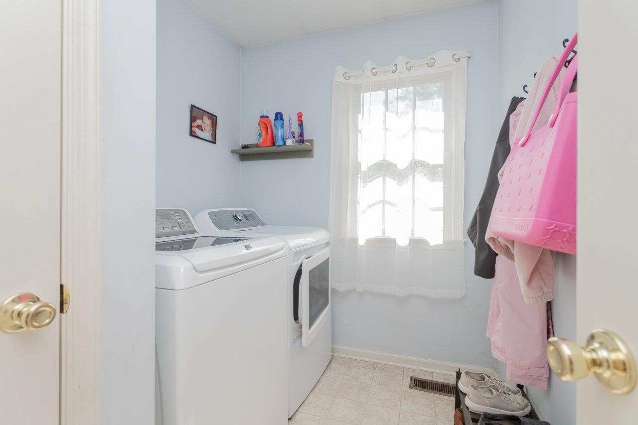 1480 Bluewater Road Harrisonburg, VA 22801 - Photo 17 of 46 a utility room with a window dryer and washer
