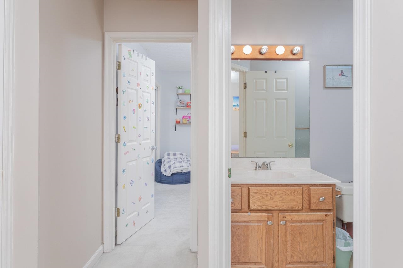 1480 Bluewater Road Harrisonburg, VA 22801 - Photo 28 of 46 view of bathroom with a sink and mirror