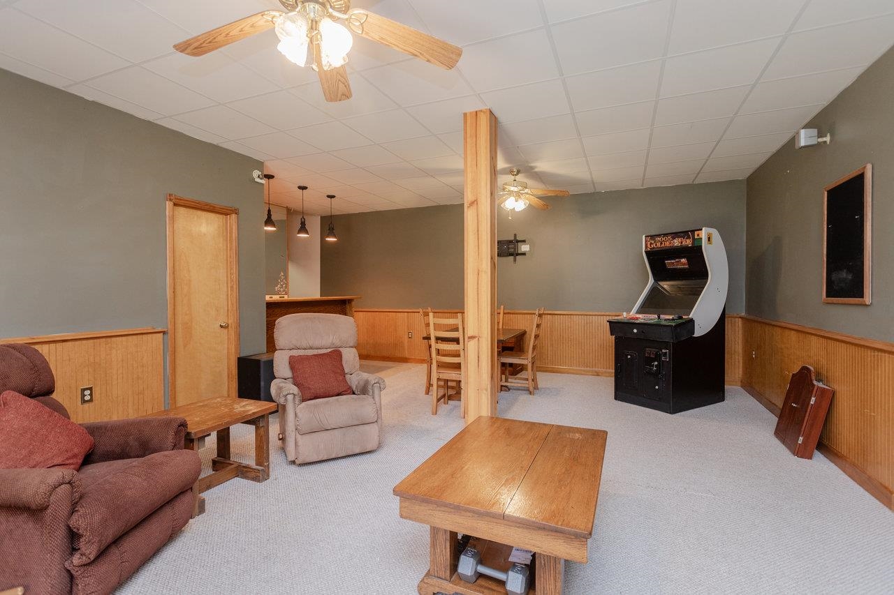 1480 Bluewater Road Harrisonburg, VA 22801 - Photo 32 of 46 a living room with furniture and a flat screen tv