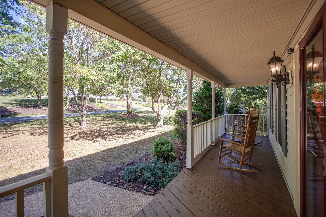 1480 Bluewater Road Harrisonburg, VA 22801 - Photo 38 of 46 a view of a porch with furniture and wooden floor