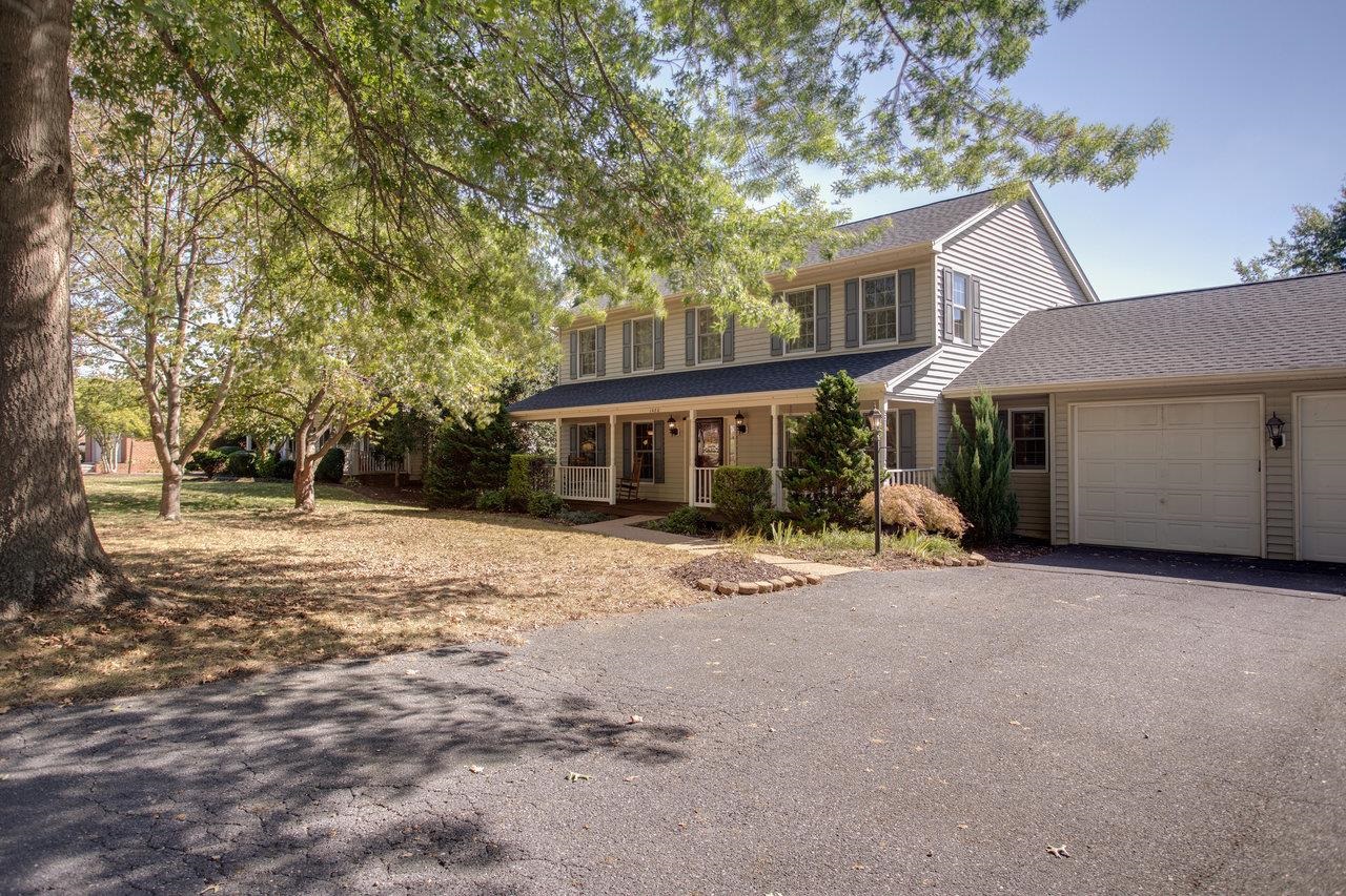 1480 Bluewater Road Harrisonburg, VA 22801 - Photo 39 of 46 a front view of a house with a yard and garage